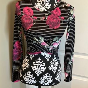 Super fun black and white striped long sleeve cropped Tee with gorgeous flowers